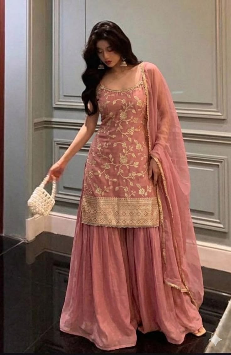 Soft dusty pink sharara suit with golden floral…